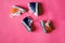 Miniature sneakers isolated on color background
