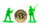 Miniature Soldier and bitcoin on white background