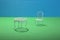 Miniature table and chair on a colored background