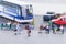 Miniature travellers at a bus station