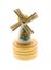 Miniature wooden windmill souvenir on white backgr