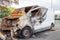 Minibus after a fire, burnt body and interior of the car. Burnt rusty car after fire or accident. Car after the fire