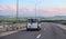 Minibus Moves along the Country Highway