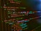 Minificated web development javascript code close up in sunset rays. Programming Coding with editor colorful themes. Lines of Html