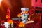 Minifigure Alex with sword running away from the Magma Cube. Characters of the game Minecraft