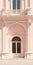 Minimal Baroque Architecture: Pink Building With Neoclassical Clarity