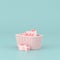 Minimal conceptual idea of present boxes in the weave basket on pastel background. 3D rendering
