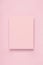 Minimal frame geometric composition mock up. Blank sheet of pink paper postcard on pastel