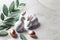 Minimal style Easter eggs, bunny rabbit, eucalyptus leaves on marble table. Generative ai