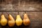 Minimal Style Pears on Rustic Wooden Background AI Generated