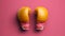 Minimalist 1980s Design Boxing Gloves In Vibrant Orange Yellow