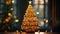 Minimalist background with golden artificial Christmas tree. Shiny decorated Christmas tree with Christmas baubles
