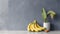 Minimalist Banana Arrangement On Gray Wall And Concrete