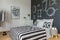 Minimalist bedroom with blackboard wall