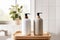 minimalist beige and white liquid soap dispensers in interior setting