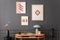 Minimalist composition of living room interior with mock up poster frame, wooden desk, books, lamp, sculpture, black stand, vase