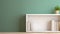 Minimalist Corner Shelf: White Wood Frame Against Green Wall