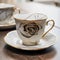 Minimalist elegant porcelain teacups with gold pattern on wooden table, chinese bone porcelain. Close-up photo. Generative AI