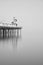 Minimalist fine art landscape image of new pier in juxtaposition