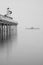 Minimalist fine art landscape image of new pier in juxtaposition