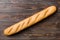 Minimalist french baguette on colored background. fresh bread as background, top view with space for your text or design