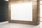 Minimalist gallery space featuring a large white poster on wooden wall, sleek design elements. Exhibition concept.