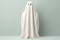 Minimalist Ghost Sheet Halloween Costume On Pastel Background
