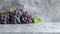 Minimalist Grape Arrangement On Polished Concrete Background