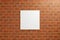 Minimalist hanging square wooden poster or photo frame mockup in brick wall. 3D Rendering