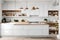 minimalist kitchen with hidden storage solutions and a monochromatic color scheme