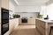 a minimalist kitchen with sleek, streamlined appliances and simple storage