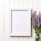 Minimalist Lavender Picture Frame Mockup On White Wooden Background