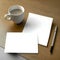 Minimalist layout, white blank sheet, cup, pen