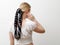 Minimalist photo, Fashionable girl in stylish summer things . View from the back. Earrings, a ring , a scarf on her head