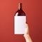 Minimalist Photorealistic Rendering Of Female Hand Holding Blank Paper In Wine Bottle