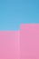 Minimalist pink wall and blue sky background.Architecture and geometry aesthetic. Trendy colours stylish wallpaper