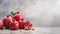 Minimalist Pomegranate Arrangement On Polished Concrete