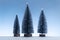 Minimalist scene with miniature fir trees and sparkly silver ground and blue sky