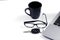 Minimalist style with black coffee cup and eyeglasses and car key and labtop computer