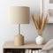 Minimalist Taupe And Gold Lamp On Wooden Shelf