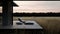 Minimalist Textiles Ethereal Nature Scenes Of A House, Deck, And Lawn At Dusk