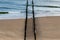 Minimalist view of the Dutch coastline with the water breakers during low tide of the North sea under a dramatic sky