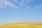 Minimalist view of landscape with meadow and sky