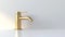 Minimalist water tap with a matte golden finish, isolated against a white background. Modern faucet design. Concept of