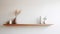 Minimalist White Shelf With Woods And Vase On White Wall