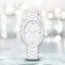 Minimalist white watch on bright blurry background