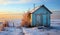 Minimalist winter landscape by the water, with a wooden cabin. AI generated