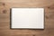 Minimalist workspace Top view of a notebook on wooden flooring