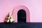 minimalistic abstract christmas scene. pink arch on a black background and a gold Christmas tree.