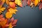 Minimalistic autumn design Maple leaves, cones on dark gray backdrop